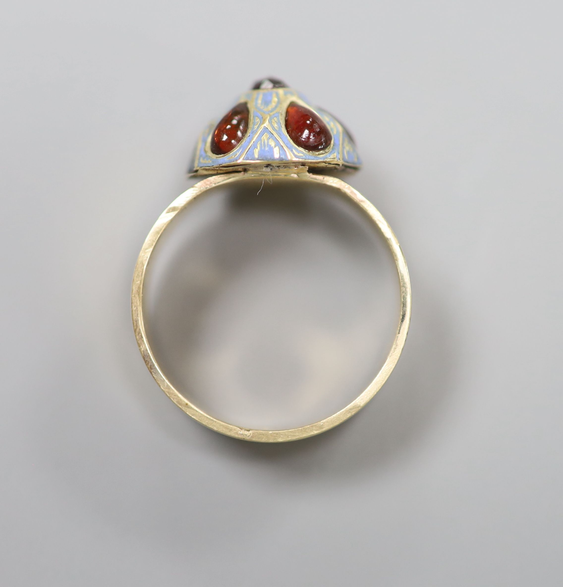 A modern 9ct gold, six stone garnet and enamel set domed top 'button' dress ring (adapted)